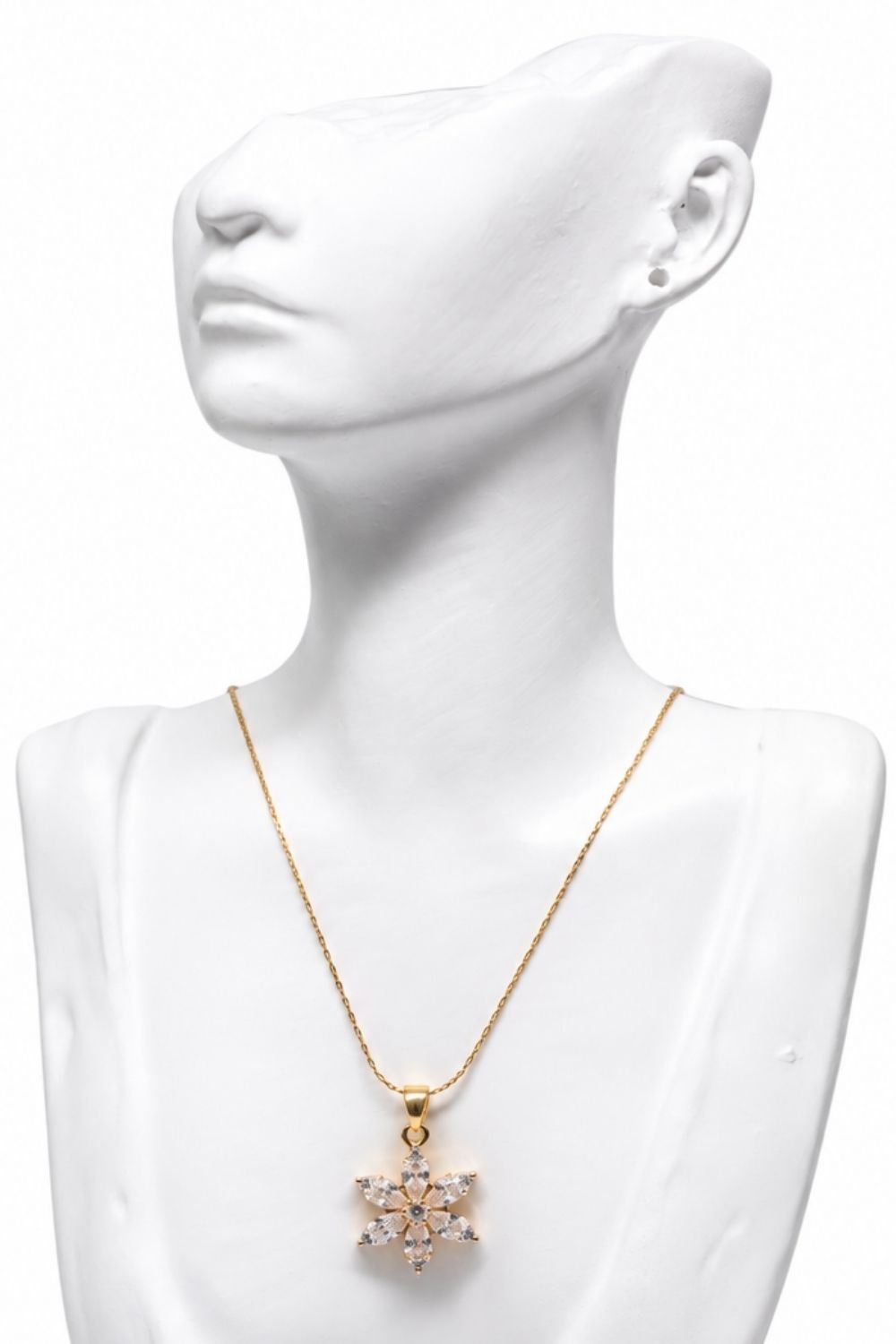 Floral inspire crystal pendant with fine chain.