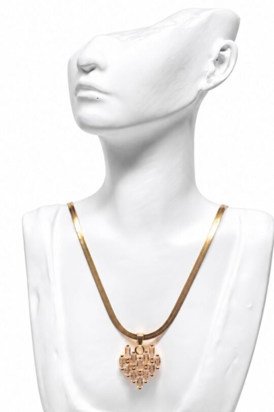 Gold-tone geometric pendant necklace.